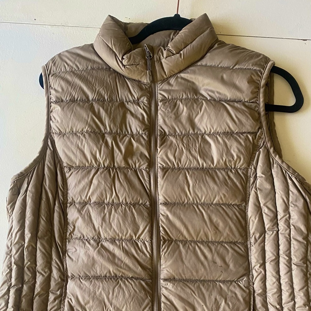 Weatherproof light brown winter vest.